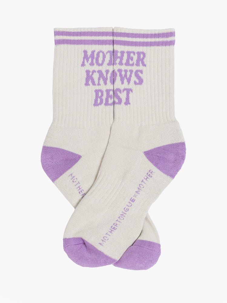 Flat double side view of a vintage tube sock in cream with lavender lettering.