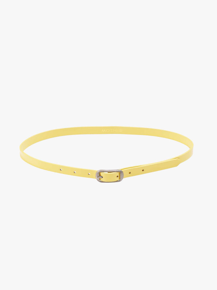 Flat view of a narrow belt is made from 100% leather with a pastel yellow coating and silver hardware.