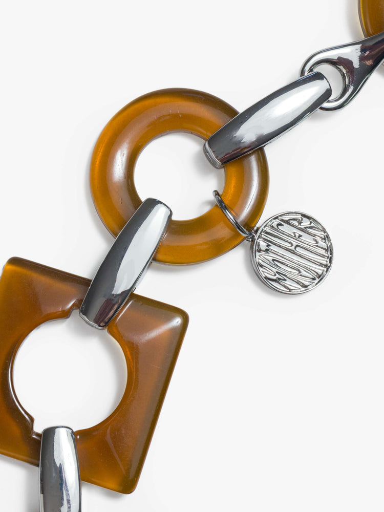 Swatch chunky belt featuring brown square and circular resin pieces connected by metal links.