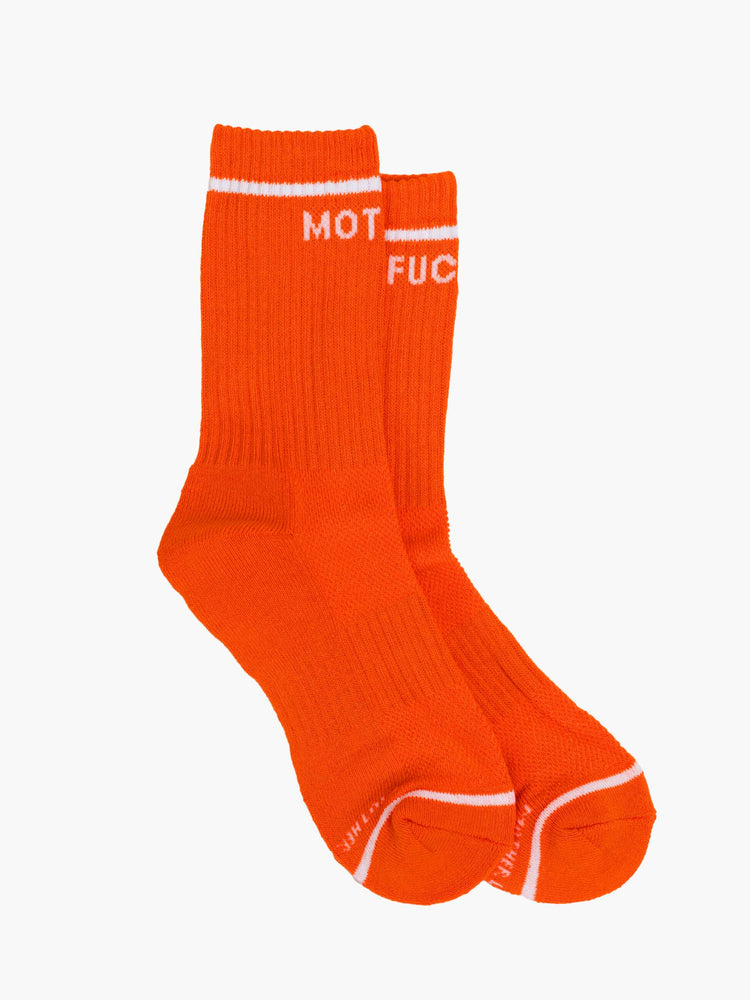 Flat view of a vintage-inspired tube socks in bright orange and bold lettering in white.