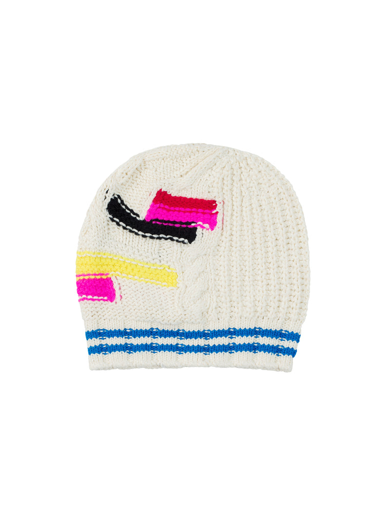 Flat of an off white beanie with colorful color blocking and a blue stripe rib.