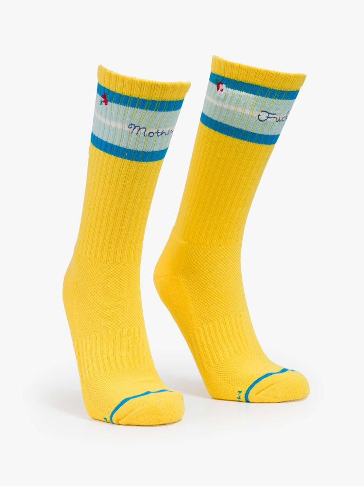 Flat view of extra-tall tube socks with an explicit message from MOTHER. Shown here in yellow with blue stripes and text across the top