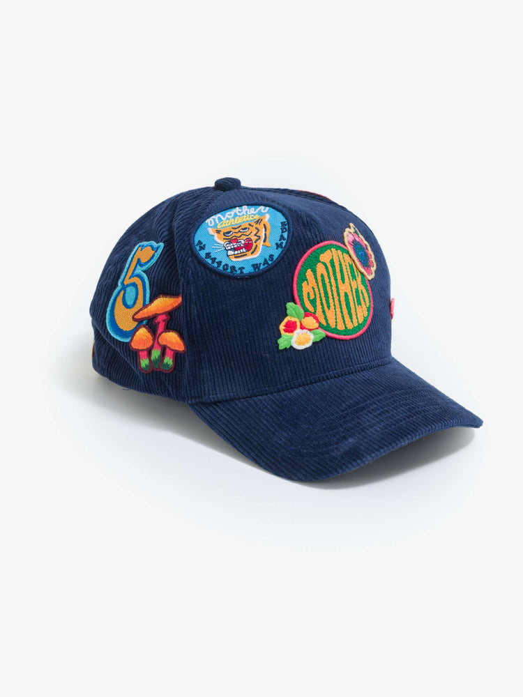Flat view of in a navy corduroy hat with MOTHER's name on the front and colorful patches throughout.