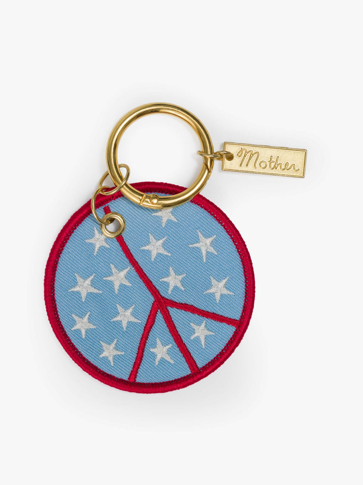 A vintage-inspired keychain with a 2.5-inch patch and 1.25-inch ring and a peace sign.