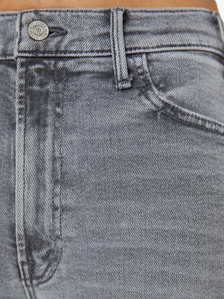 Swatch view of a petite woman in a gray wide leg pants with a zip fly, high rise, 28-inch inseam and a clean hem.