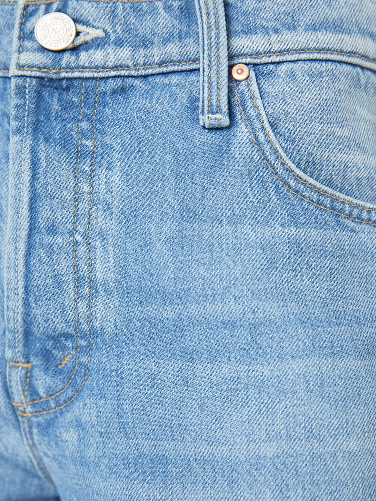 Swatch view of a petite woman in a high-waisted wide leg jeans with a zip fly, long 29-inch inseam and loose, low-slung fit. 
