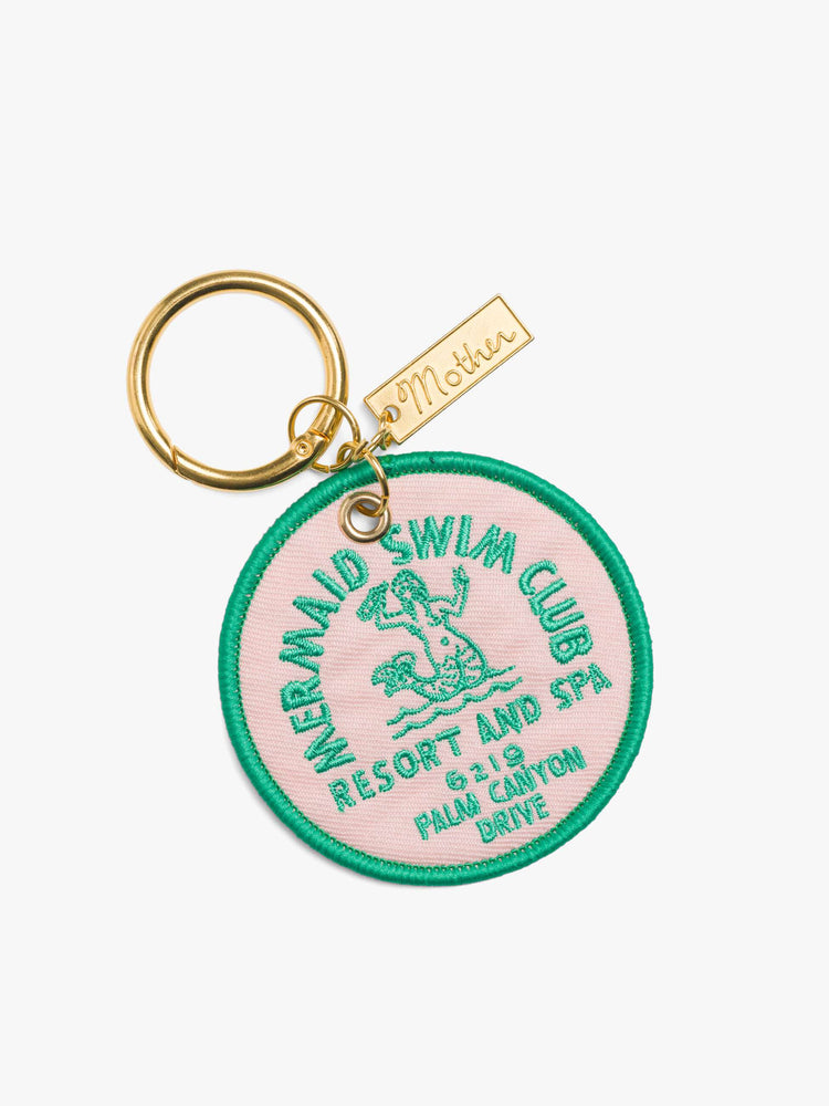 Front view of a vintage-inspired keychain with a 2.5-inch patch and 1.25-inch ring in pink and green on one side and a sun graphic and MOTHER's name in yellow, green and gold on the other.