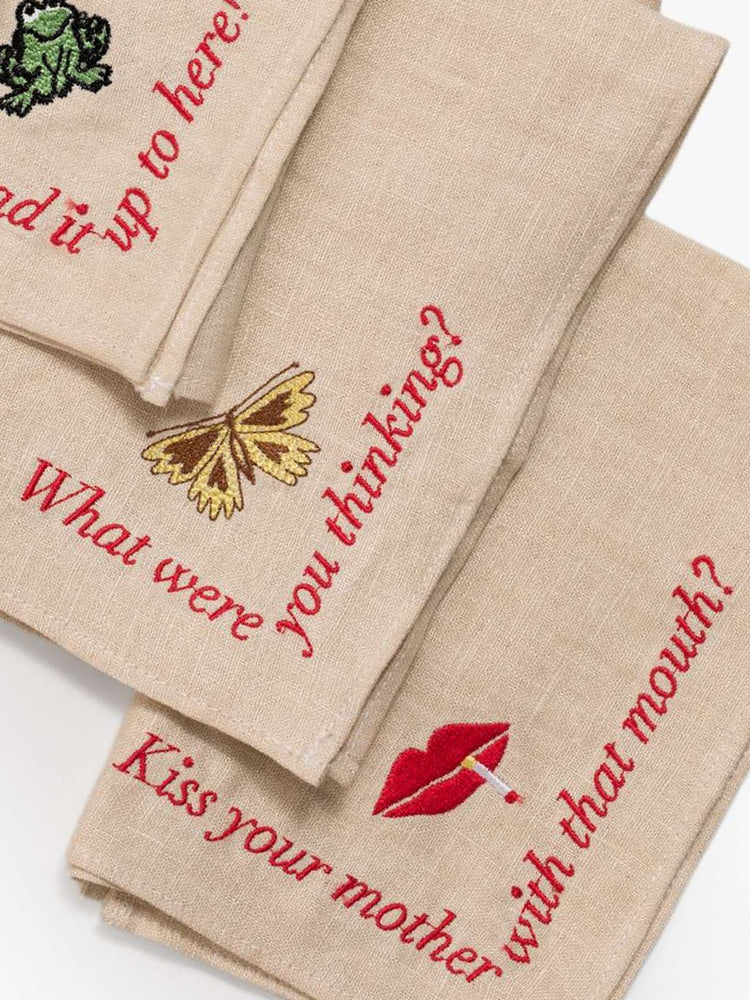 Flat view of  set of four 17-by-17-inch square napkins with MOTHER's signature touch. 