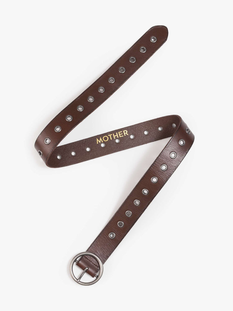 Flat  view of a dark brown vintage-inspired belt with an oversized circular buckle and round rivets throughout.