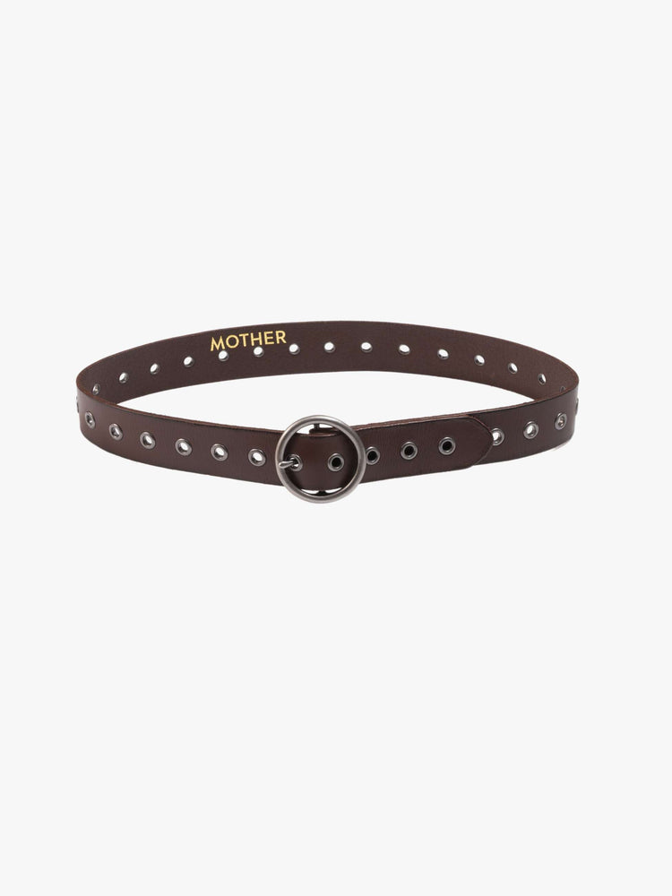 Flat view of a dark brown vintage-inspired belt with an oversized circular buckle and round rivets throughout.