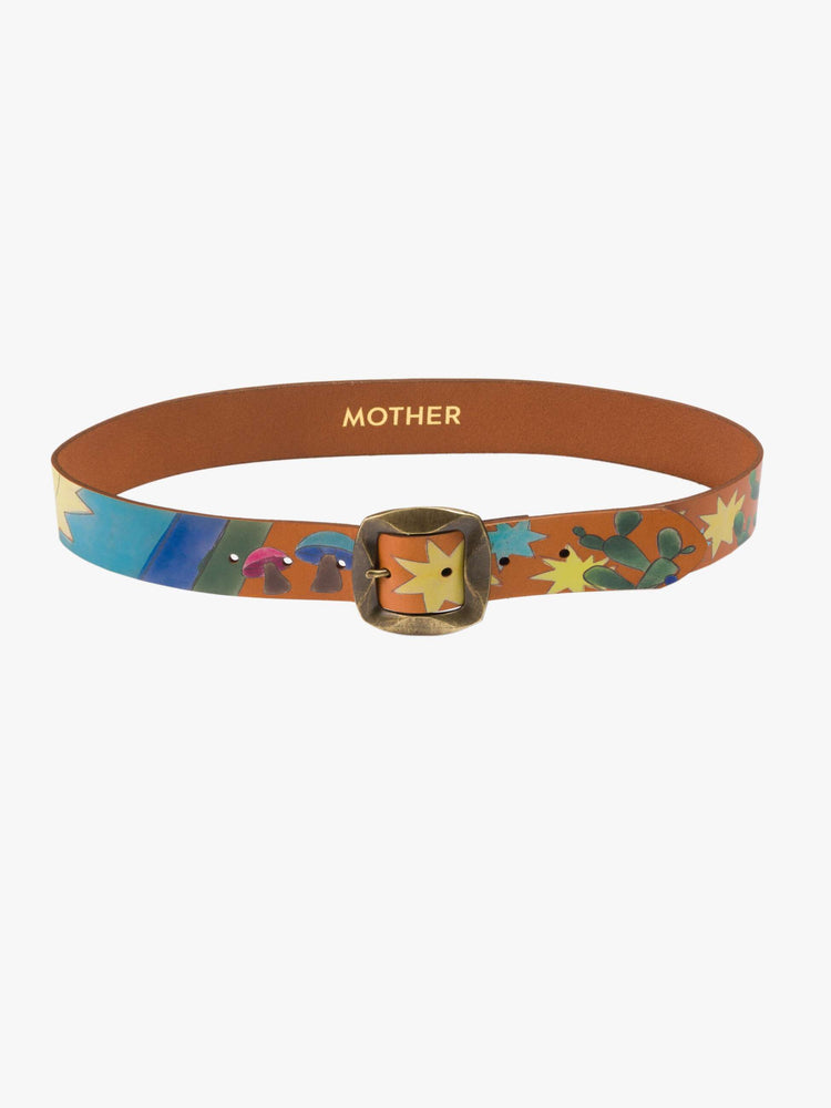 Flat view of a wide belt made from 100% leather in tan with hand-painted stars, mushrooms and rainbow stripes, and an oversized brass buckle.
