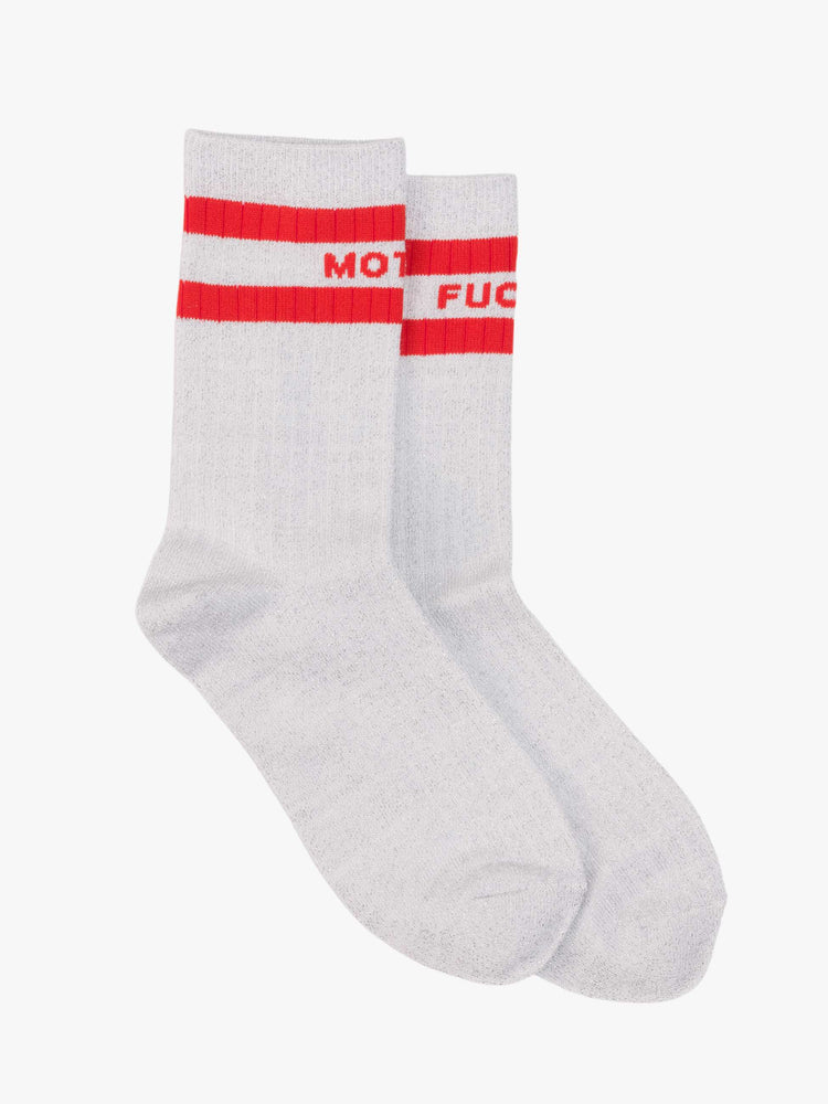 Flat view of silver glitter with red stripes and text across the top.