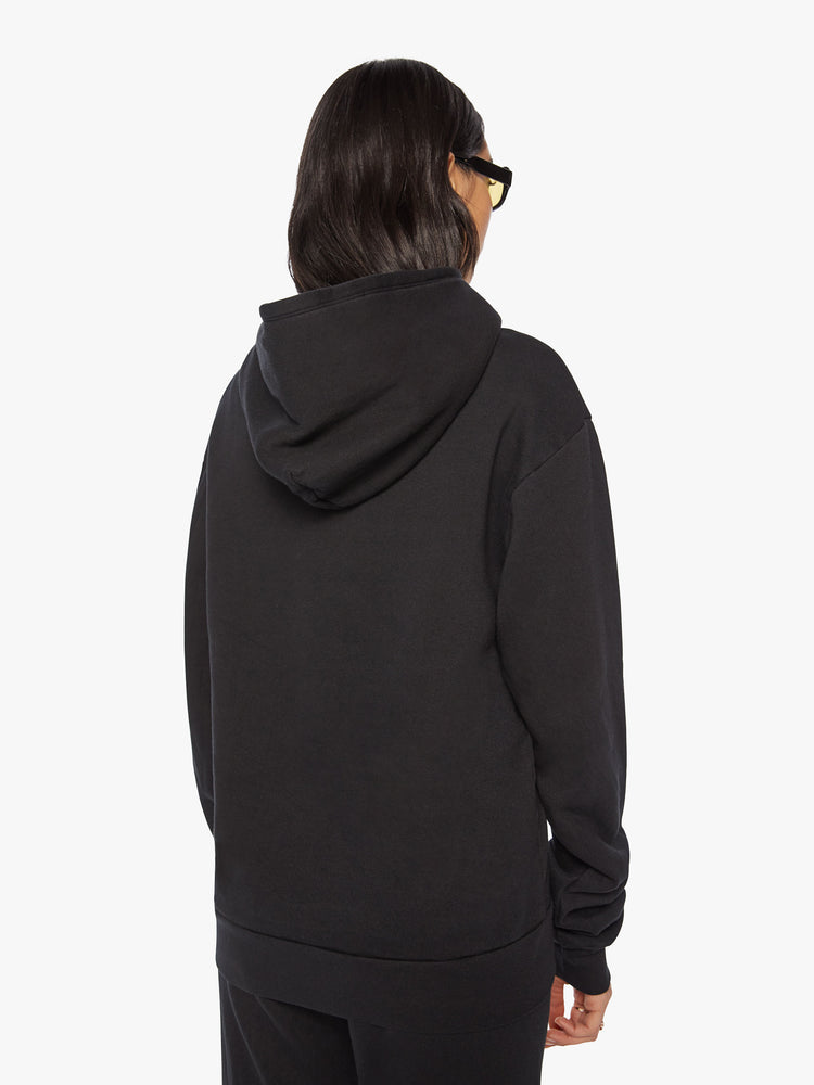 Back 3/4 view of a Womens black hoodie pullover