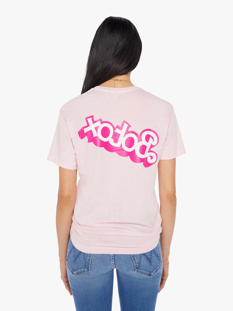 Back view of a women's light pink t-shirt with a hot pink "Botox" graphic