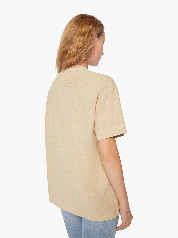 Back view of a woman in a Model Crop T features drop shoulders, a boxy fit and a slightly cropped hem in a soft khaki hue.