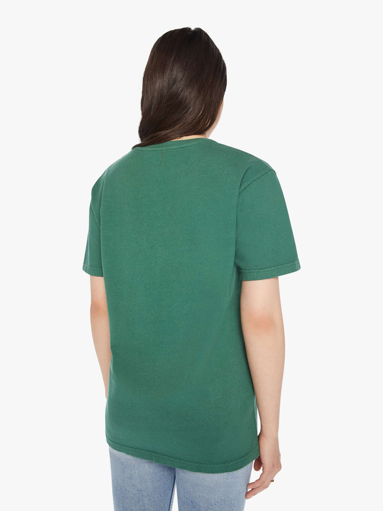 Back view of a woman green tee with a white anchor on the chest, has a ribbed crewneck and a straight fit.