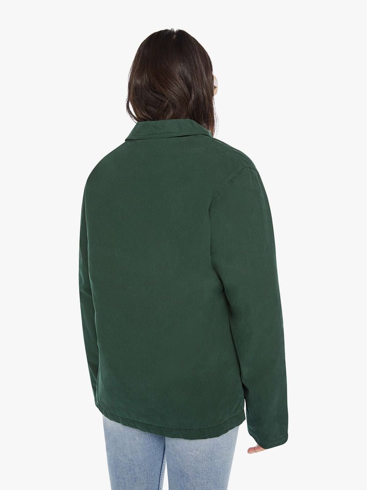 WOMEN back view of a jacket in hunter green hue with front patch pockets, long sleeves, buttons down the front and a boxy fit.