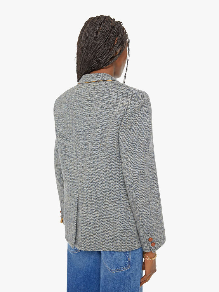 Back view vintage tweed jacket is made from 100% wool and is detailed with a leopard-lined collar and trim for a touch of color and warmth.