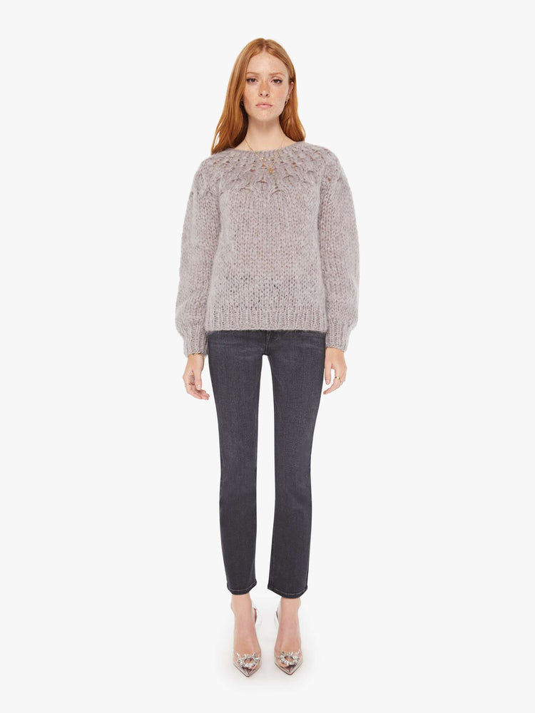 Front full body view of a womens chunky knit sweater in a grey hue featuring balloon sleeves and ribbed hems.