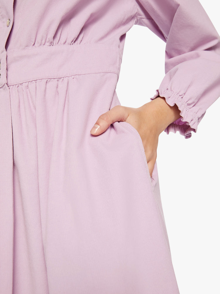 Swatch view of woman soft lilac dress with a buttoned V-neck, long sleeves, a gathered waistline and a tiered skirt.