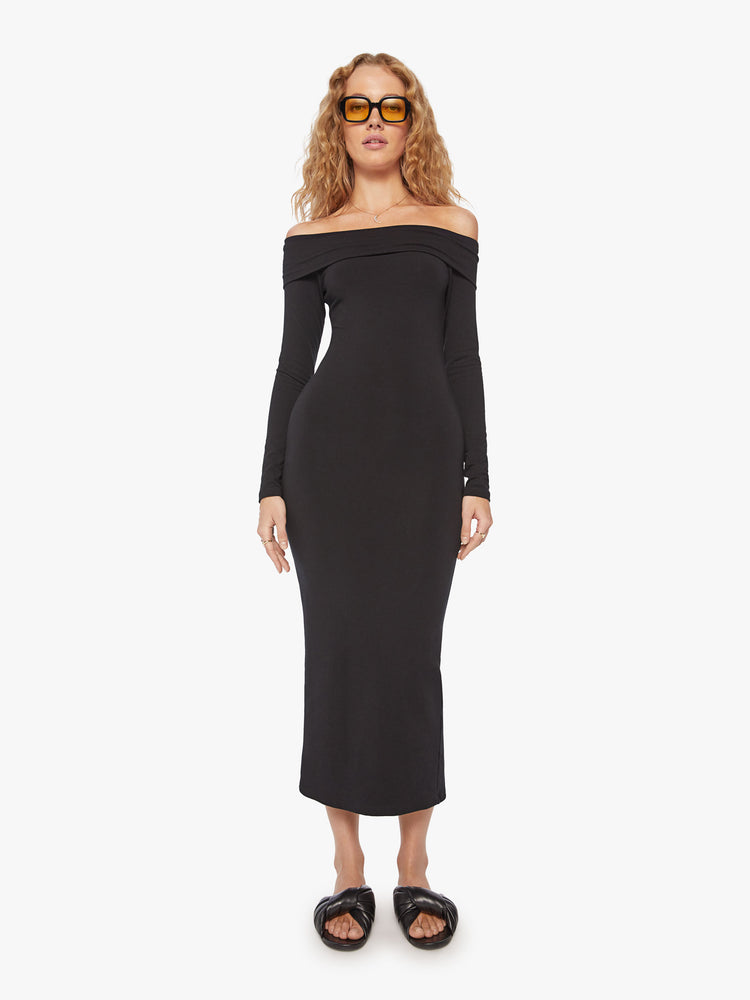 Front view of a black off-the-shoulder midi dress with long sleeves and a calf-length hem with slim flit.