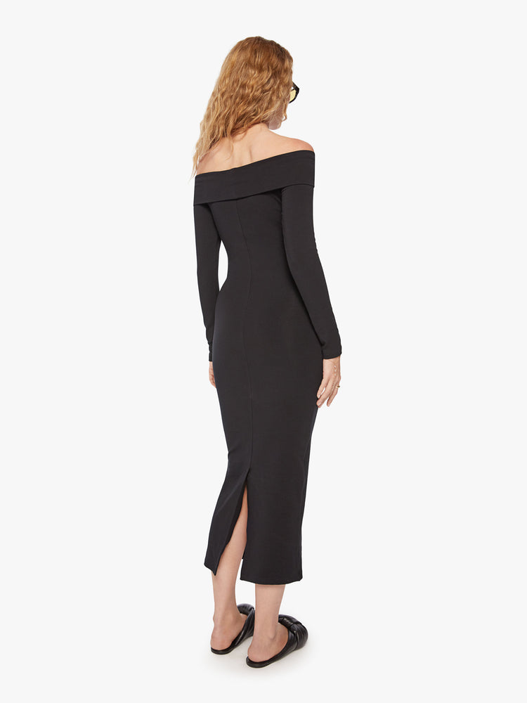 Back view of a black off-the-shoulder midi dress with long sleeves and a calf-length hem with slim flit.