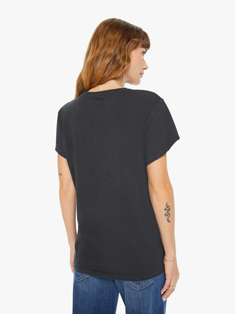 Back view of women black tee honors John Cougar Mellencamp with a faded graphic portrait on the front.