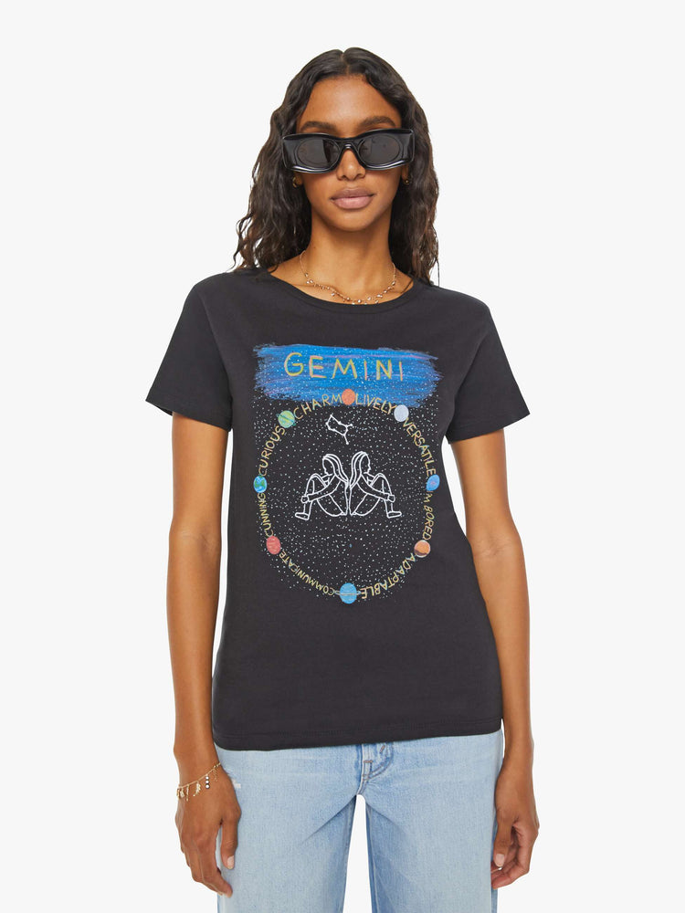 Front view of a woman black tee features the twins of the Gemini, the third astrological sign in the zodiac.