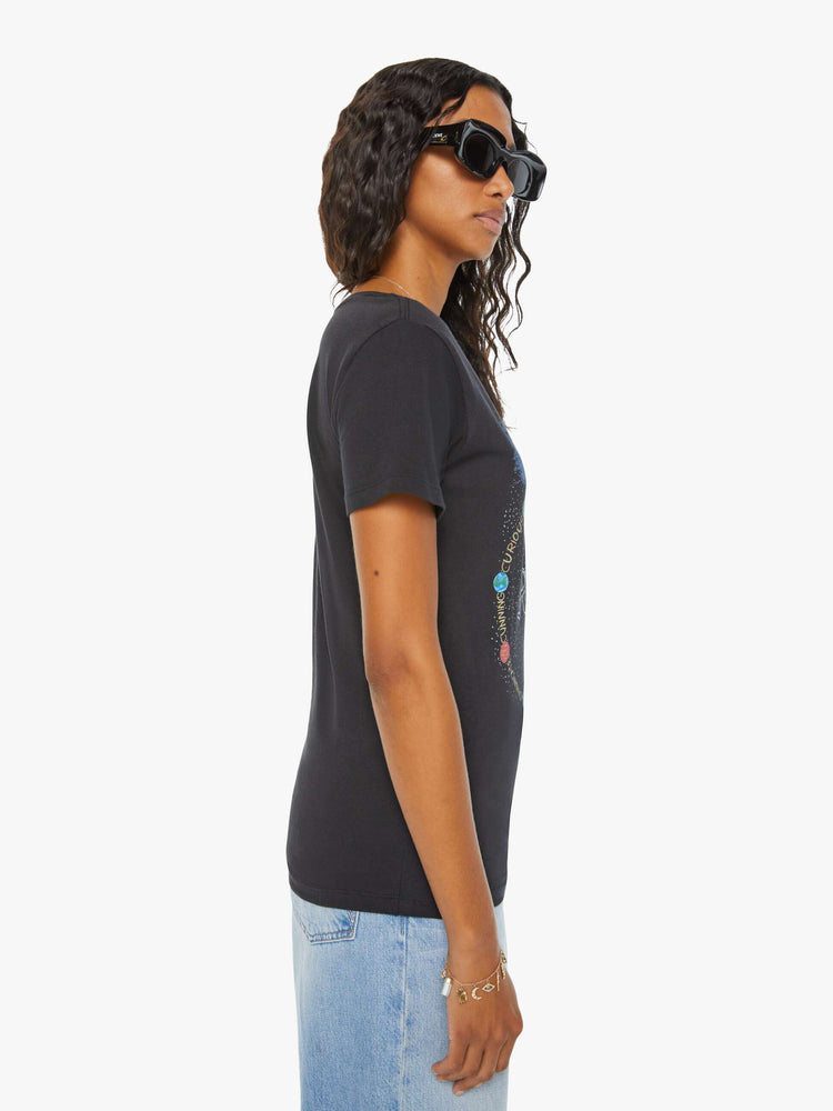Side  view of a woman black tee features the twins of the Gemini, the third astrological sign in the zodiac.
