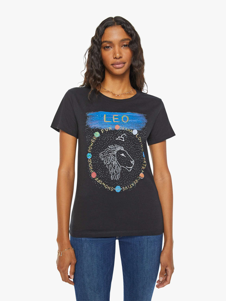 Front view of a woman in a black tee features the Leo lion, the fifth astrological sign in the zodiac.