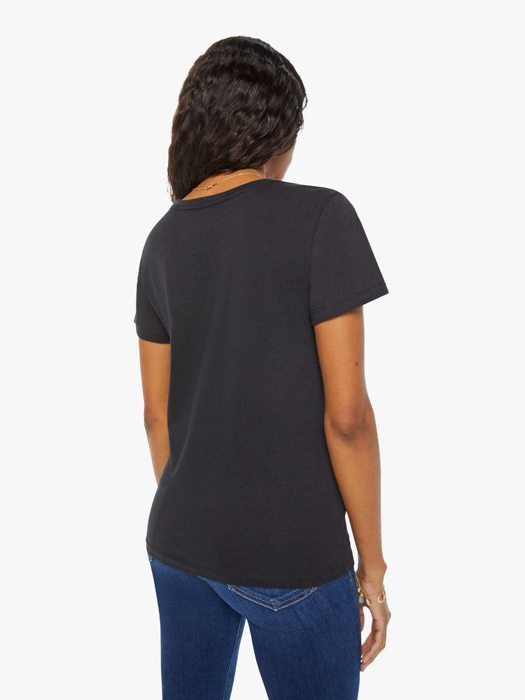 Back  view of a woman in a black tee features the Leo lion, the fifth astrological sign in the zodiac.