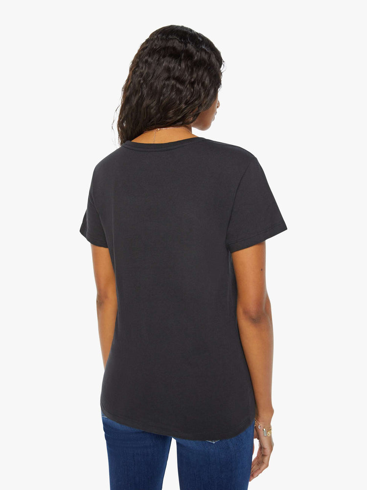 Back view of a woman black tee eatures the Virgo maiden, the sixth astrological sign in the zodiac.