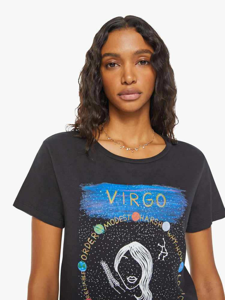 Close up view of a woman black tee eatures the Virgo maiden, the sixth astrological sign in the zodiac.