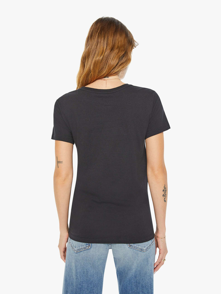 Back view of a woman black tee features the Libra scale, the seventh astrological sign in the zodiac.