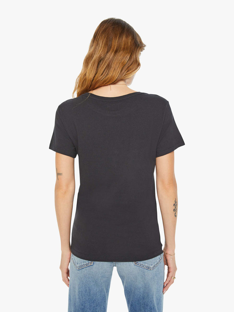 Back view of a woman black tee features an archer, the symbol of the Sagittarius.