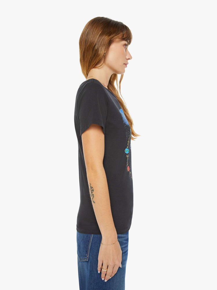 Side view of a woman black tee features a sea-goat, the symbol of the Capricorn.