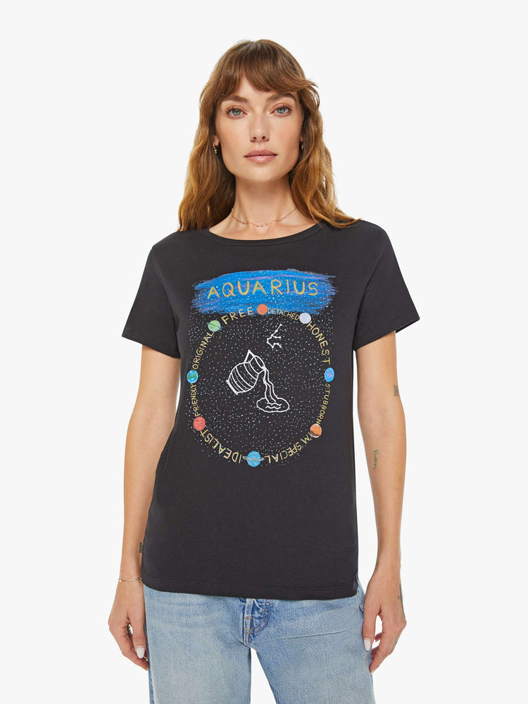 Front view of a woman black tee features a water jar symbolizing the sign of the Aquarius.