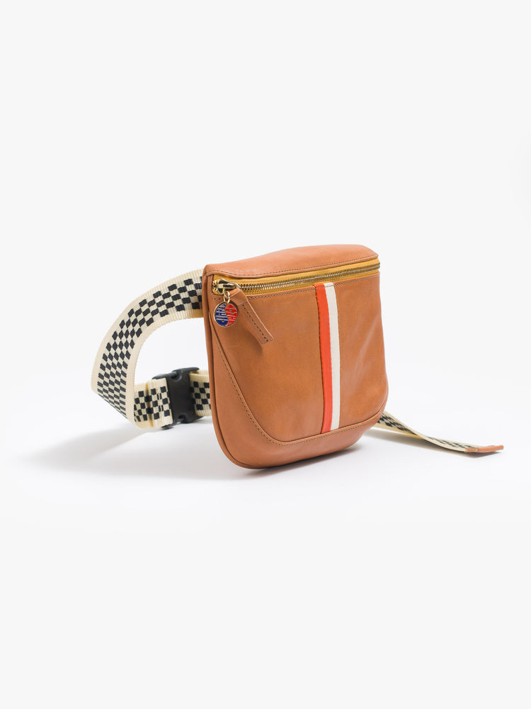 Side view of a waist bag is a brown designed with a zip closure, checkered strap and white and orange stripes down the front.