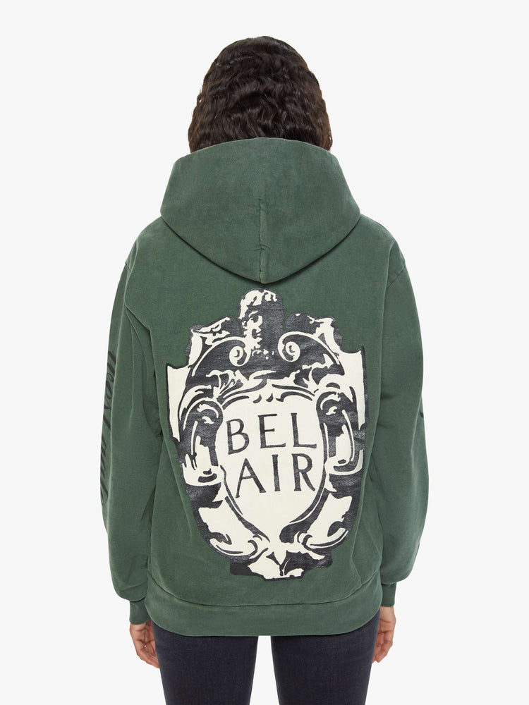 WOMEN back view sweatshirt in forest green has a front patch pocket, ribbed hems and a slightly oversized fit referencing the Los Angeles Neighborhood.