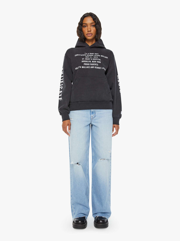 WOMEN full body view of a black front patch pocket, ribbed hems and a slightly oversized fit sweatshirt with reference to the birthday of Biggie Smalls.