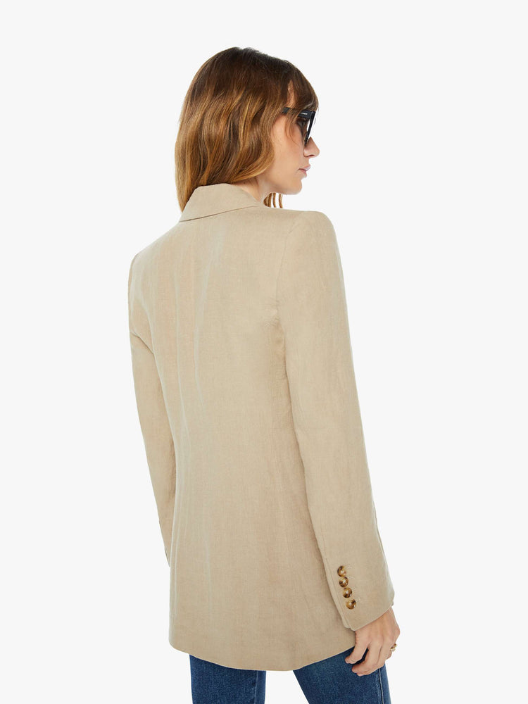 Back view of a womens tank blazer featuring two buttons and four front pockets.