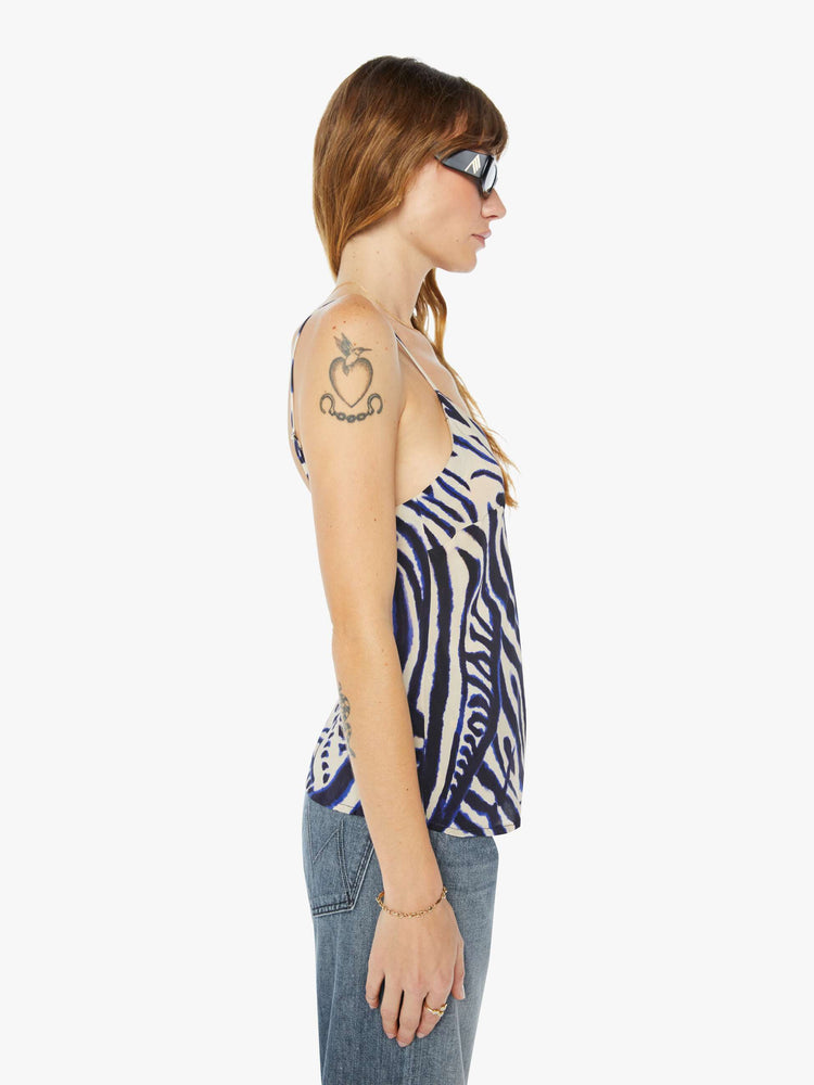 Side view of thin strap top featuring a zebra animal print.