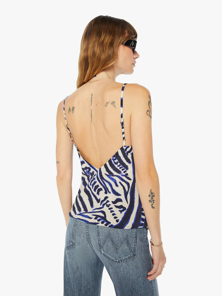 Back view of thin strap top featuring a zebra animal print.
