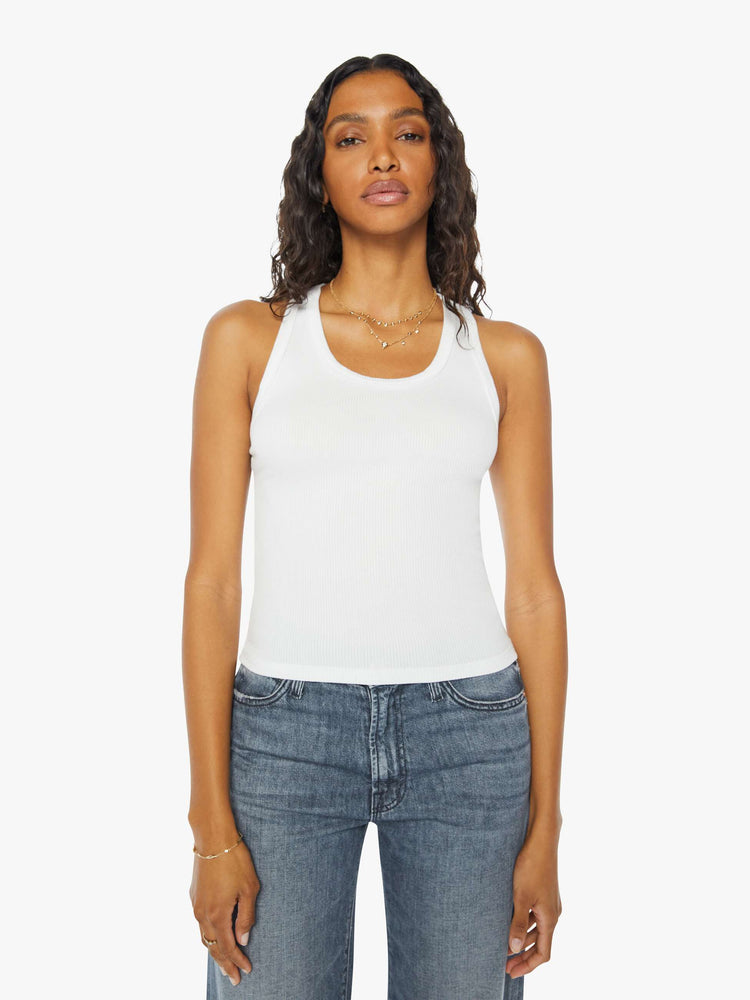 Front view of a womens fitted white tank.