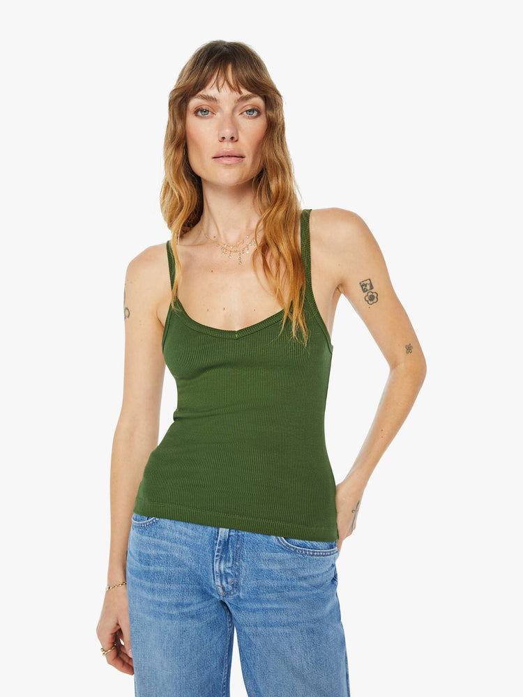Front view of a womens fitted green tank.