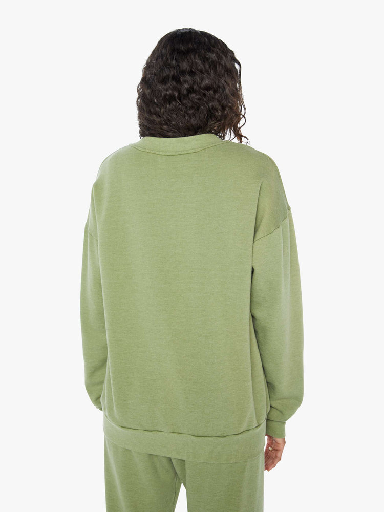 Back view of a  womens green crew neck sweatshirt featuring a relaxed fit and SPRWMN printed on the chest.