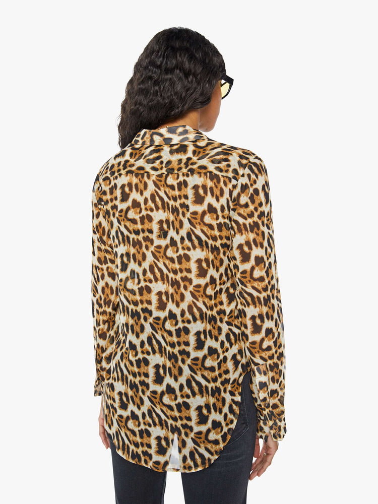 Back view of a womens sheer button down shirt featuring a leopard print.