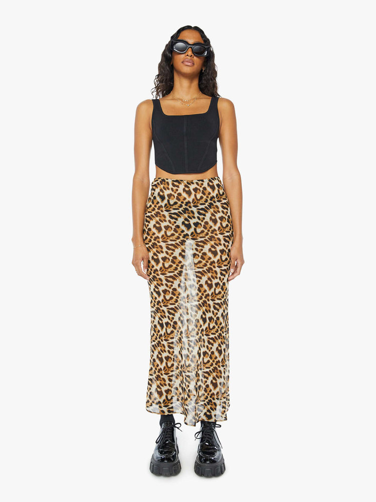 Front view of a womens sheer maxi skirt featuring a leopard print and high rise.