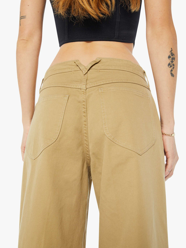 Back close up view of a womens brown pant featuring a relaxed mid rise and wide leg.
