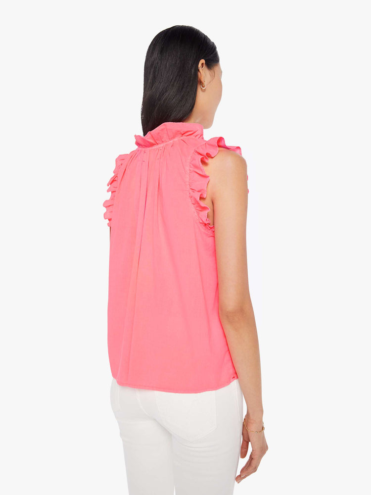 Back view of a womens neon pink blouse featuring sleeveless ruffles and a v neck.